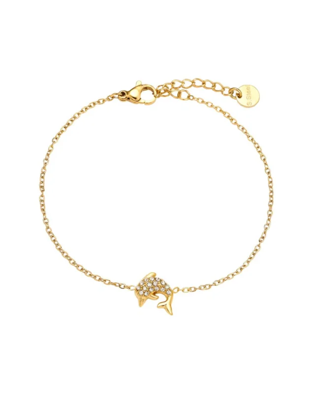 Goldene Armband "Delfin" von Dottilove vor weißen Hintergrund. Das Armband hat unten einen kleinen Delfin Anhänger mit Diamanten auf dem Rücken und besteht aus Edelstahl.