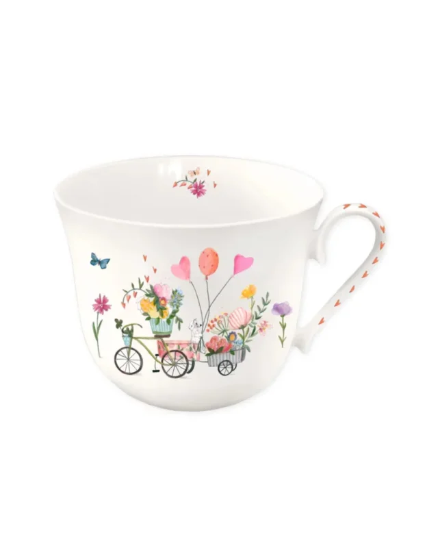 Hier ist deine neue Lieblingstasse "Auf ins Glück" vom Grätz Verlag mit Fahrrädern, Blumen und Luftballons illustriert von Silke Leffler vor einem weißen Hintergrund.