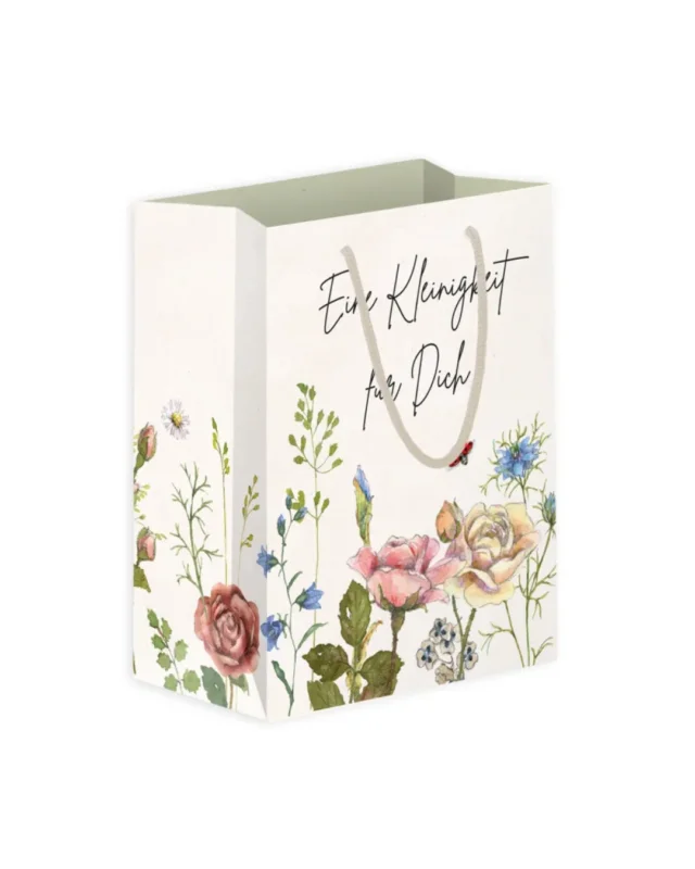 Mittelgroße Geschenktasche "Rosengarten" vor einem weißen Hintergrund. Das Motiv besteht aus verschiedenen Blumen und Pflanzen mit der Aufschrift "Eine Kleinigkeit für dich".