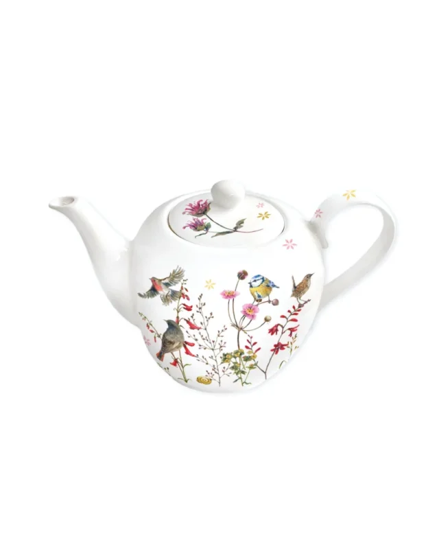 Teekanne Zeit für Harmonie vom Grätz Verlag mit Vogel- und Blumenmotiven von Daniela Drescher vor weißem Hintergrund.