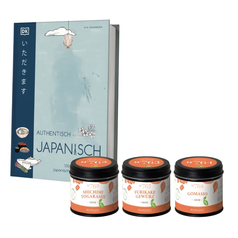 Kochbuch mit drei Gewürzen: Shichimi Togarashi, Furikake und Gomasio in Streudosen.