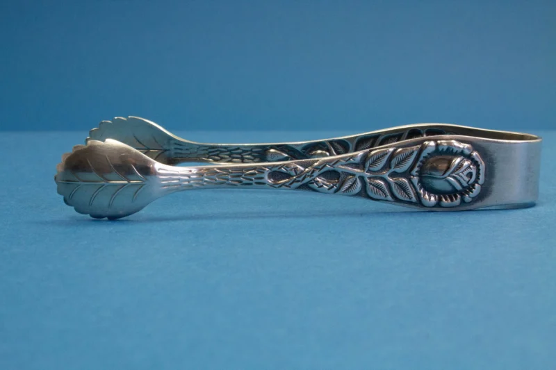 Silver plated sugar tongs with roses